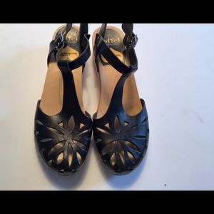 Toffel Made in Sweden strapped clogs.